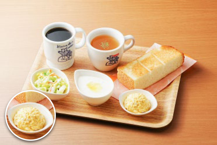 Komeda's Coffee set menu card at Comfort Inn Fukuoka Tenjin showing five breakfast options