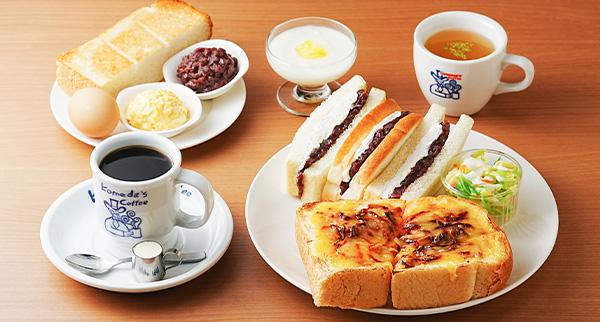 Komeda's Coffee breakfast set at Comfort Inn Fukuoka Tenjin — toast, yogurt, salad, and drink