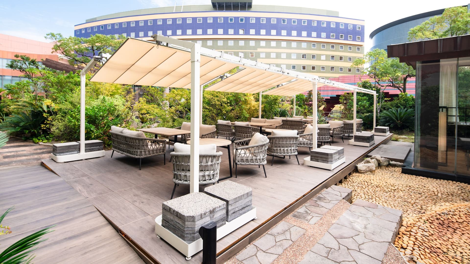 Grand Club Garden lounge terrace with outdoor seating