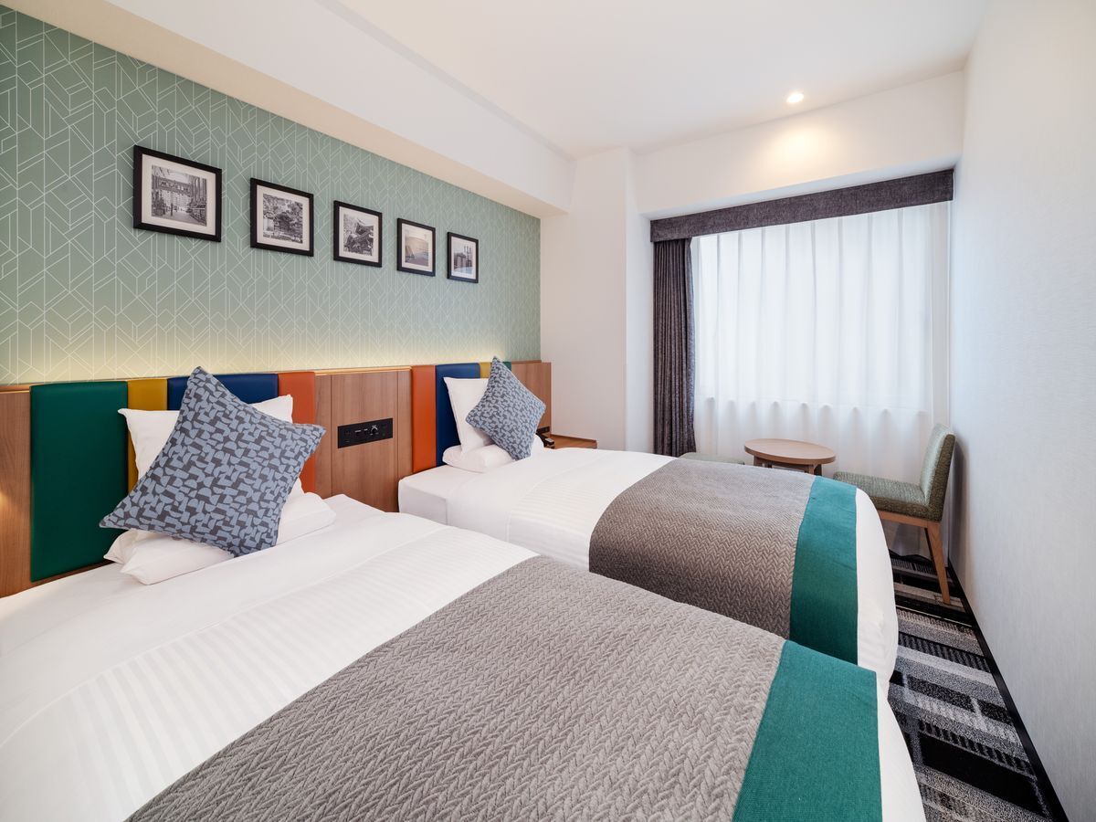 Comfort Twin room with two beds and lounge corner
