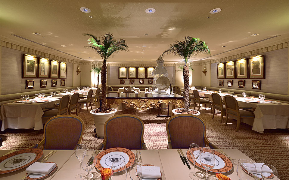 Hotel Nikko Fukuoka Les Celebrites French restaurant interior with palm trees and white tablecloths