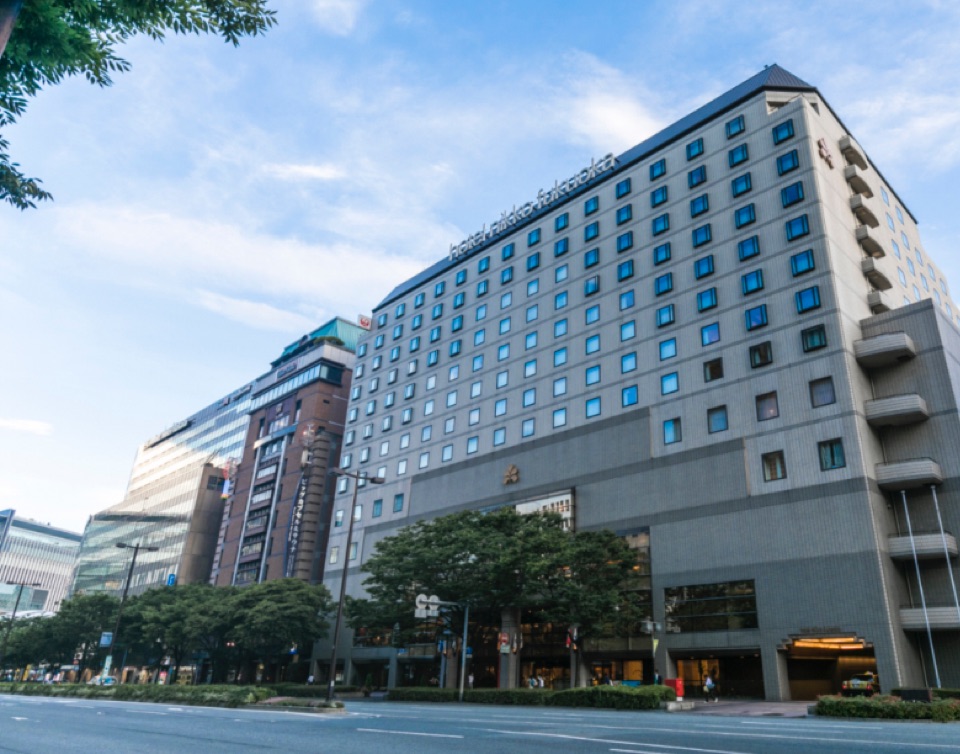 Hotel Nikko Fukuoka exterior — full building facade viewed from Hakataeki-mae street