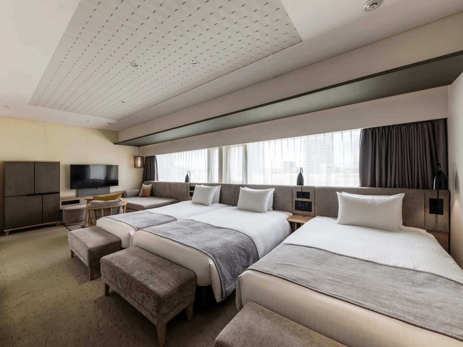 Solaria Nishitetsu Hotel Fukuoka corridor and common area with warm lighting