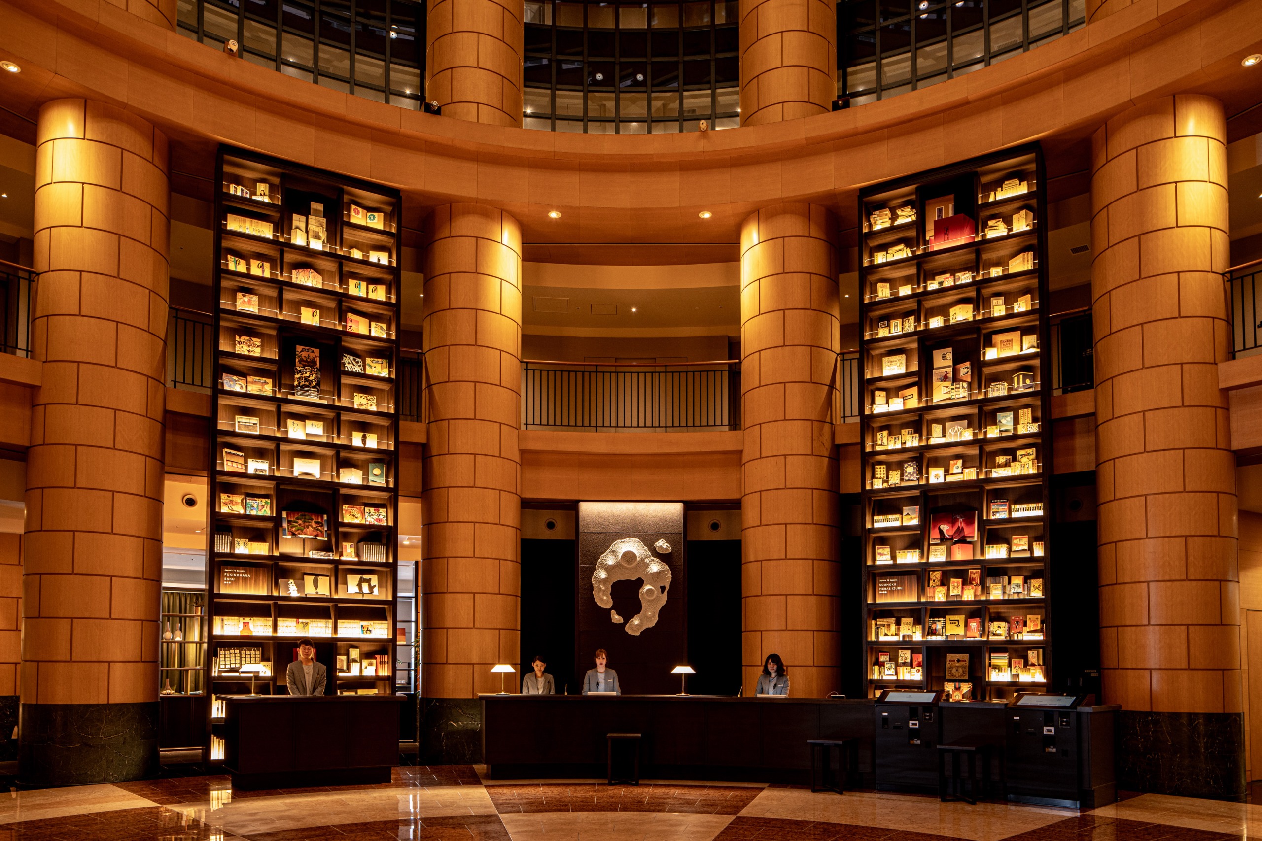 The Basics Fukuoka — 42-metre circular library atrium with 5,000 curated books across 14 wood pillars