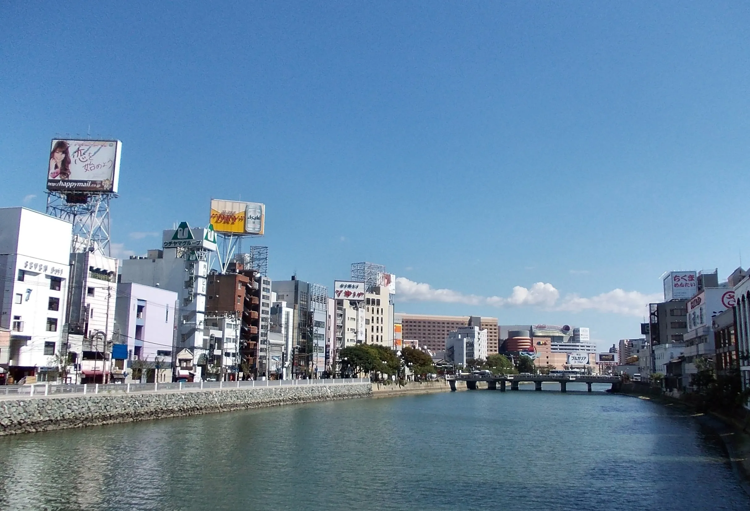 View of Nakasu and Canal City Hakata from the Fukuhaku Deai Bridge across the Naka River